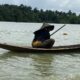 Women of Odimodi Community-woman in a boat
