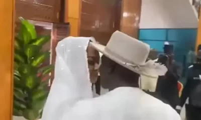 Natasha-Akpoti-and-husband-Emmanuel-Uduaghan-exchanging-a-kiss-on-March-5