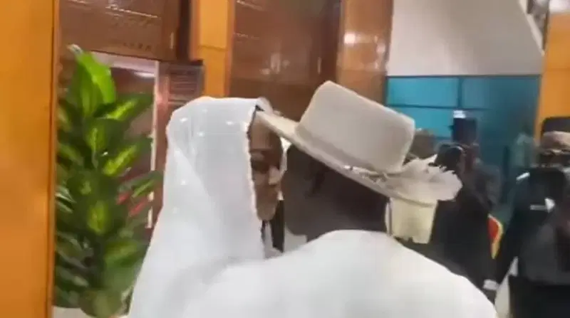 Natasha-Akpoti-and-husband-Emmanuel-Uduaghan-exchanging-a-kiss-on-March-5