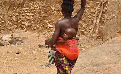 Woman and child in a farm