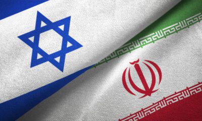 Iran and Israel flag together realtions textile cloth fabric texture
