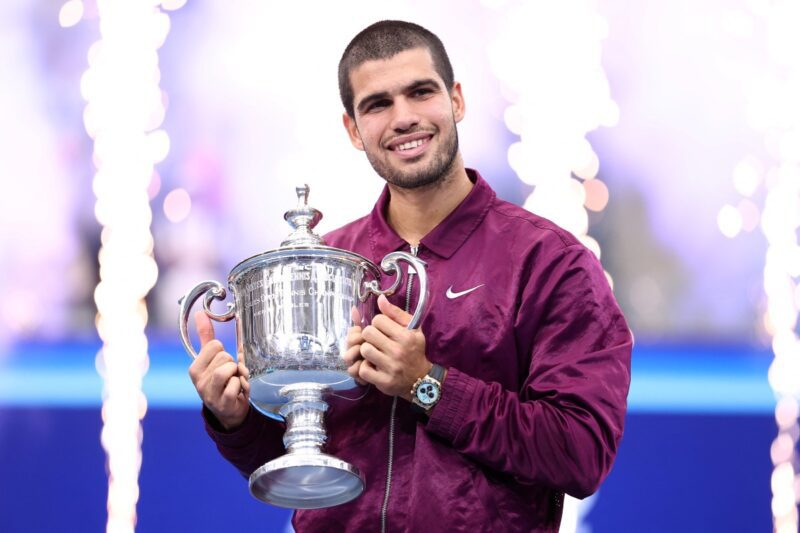 Spain's Carlos Alcaraz poses with his trophy after winning the men's singles final tennis match against Italy's Jannik Sinner on day fifteen of the US Open tennis tournament at the USTA Billie Jean King National Tennis Center in New York City on September 7, 2025. (Photo by CHARLY TRIBALLEAU / AFP)