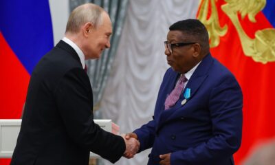 Putin Presenting State Decoration to Congolese