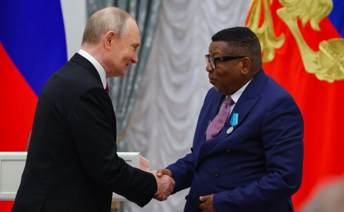 Putin Presenting State Decoration to Congolese